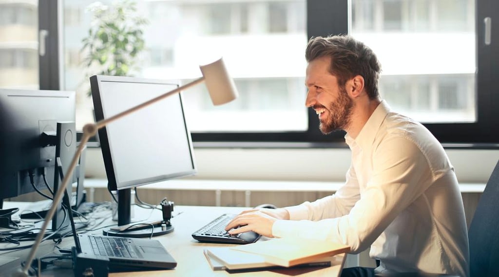outsourced accountant working on a computer
