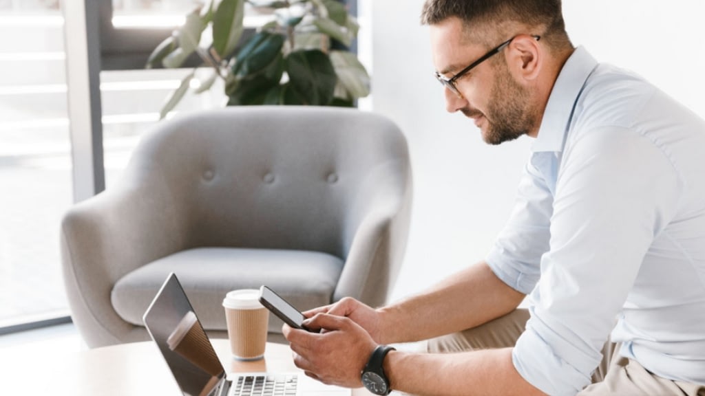 Man sitting with phone