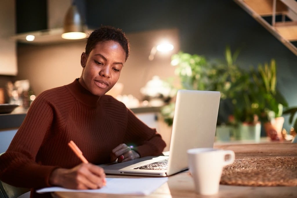 Woman doing burn rate calculations ocfo