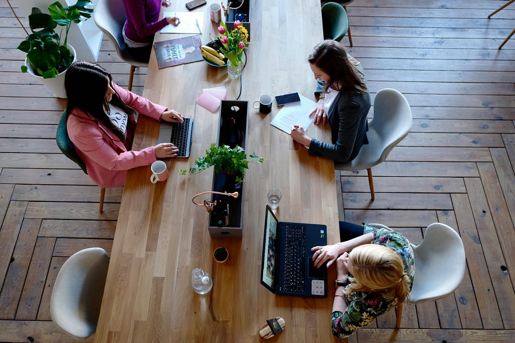 Finance professional advising SME owner on business growth strategy
