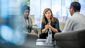 CFO support services helping a U.S. business leadership team review financial forecasts and cash flow planning