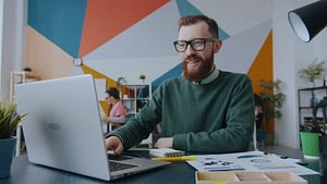 founder building a financial model for startups, with revenue drivers and projections on screen